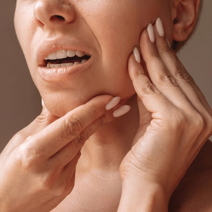 Common TMJ signs including jaw clicking, stiffness and ear pain treated in Coimbatore