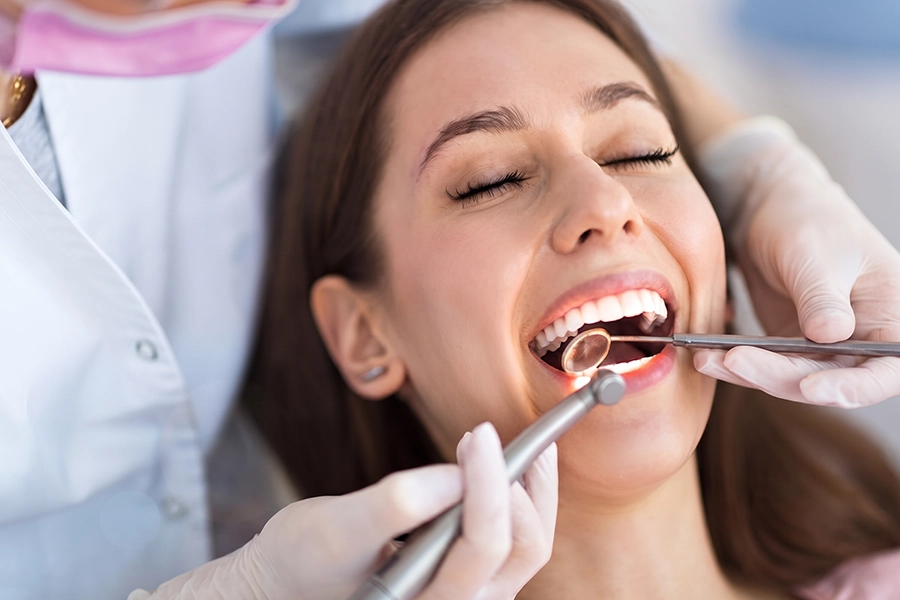 Regular brushing between teeth removes plaque and keeps tooth surfaces clean.