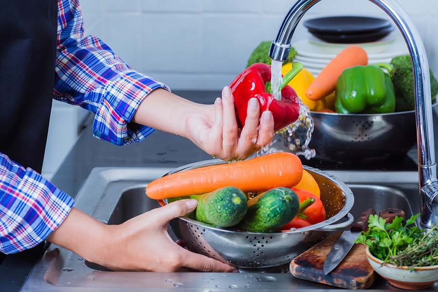Rinsing with water after coloured foods and drinks helps reduce stain buildup.