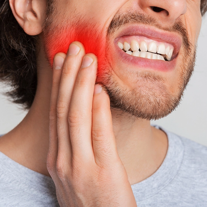 Watch for jaw pain, swelling, bleeding gums, or fever as wisdom tooth warning signs.